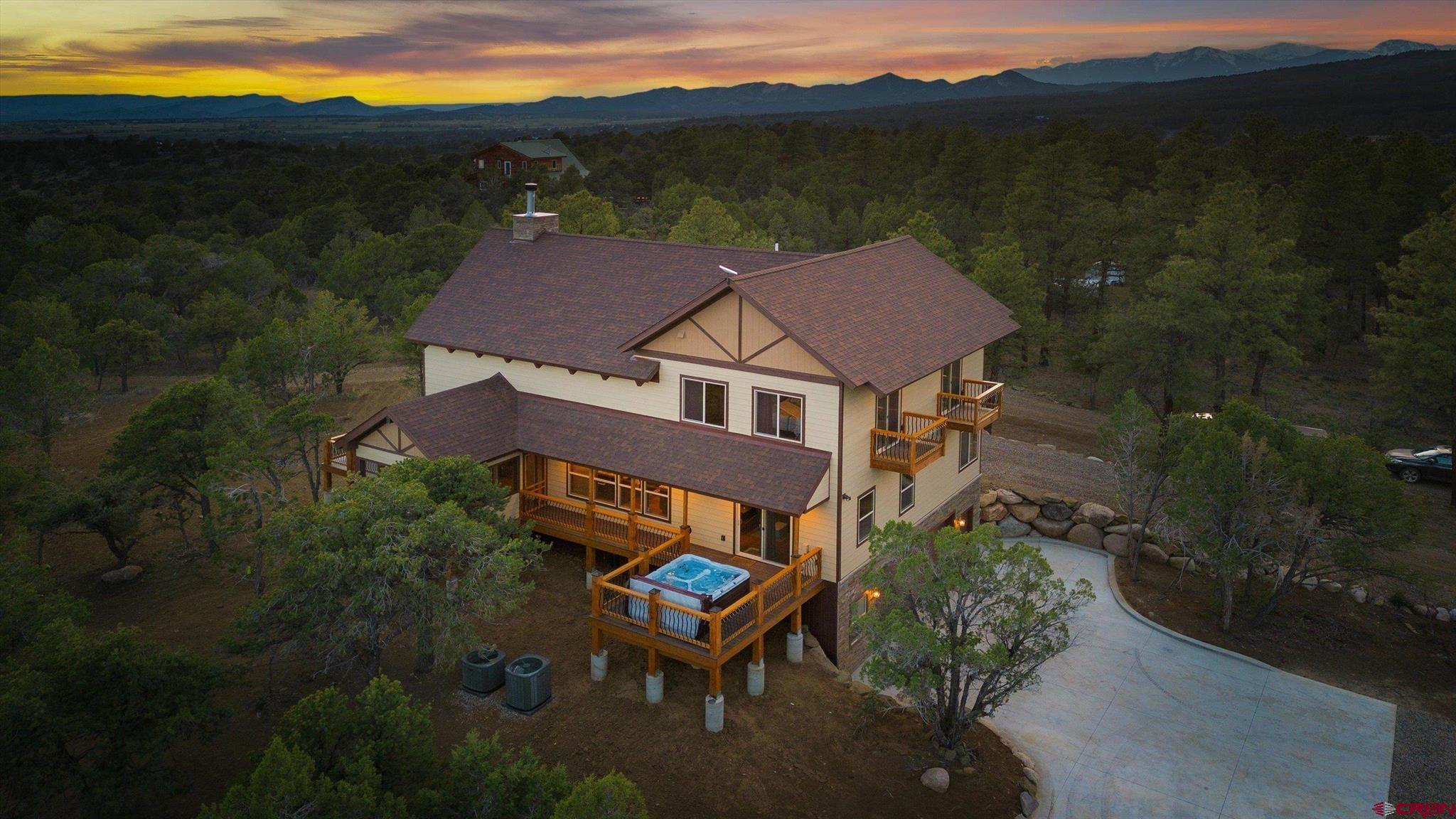 a aerial view of a house with a garden