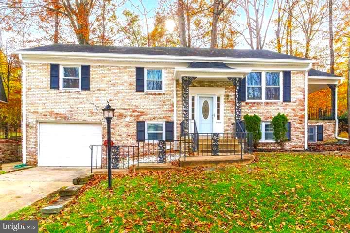 front view of house with a yard