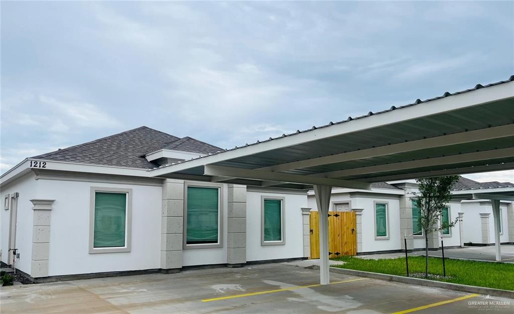 View of car parking with a carport