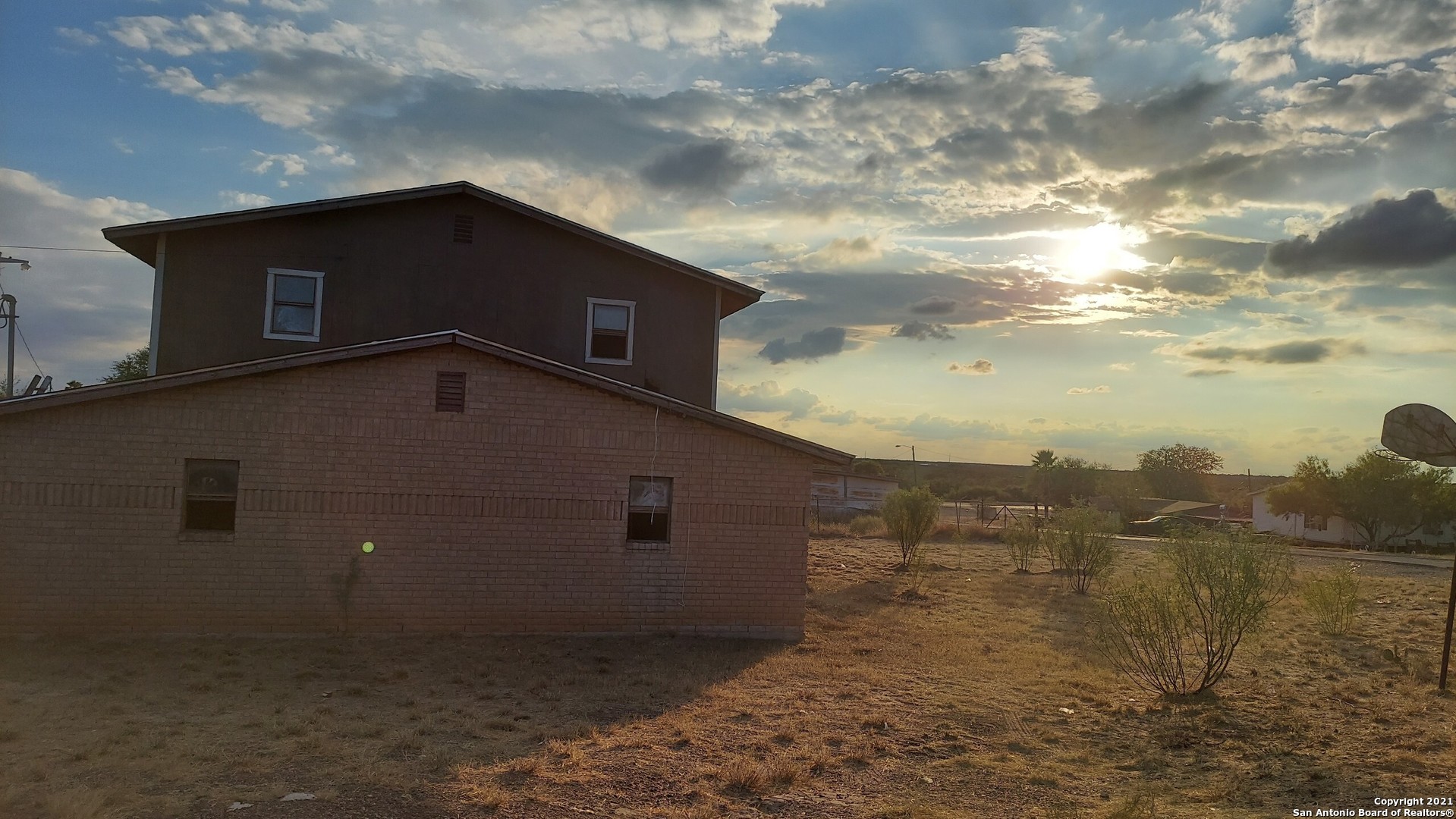 a house with river in front of it