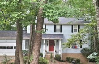 a front view of a house with yard