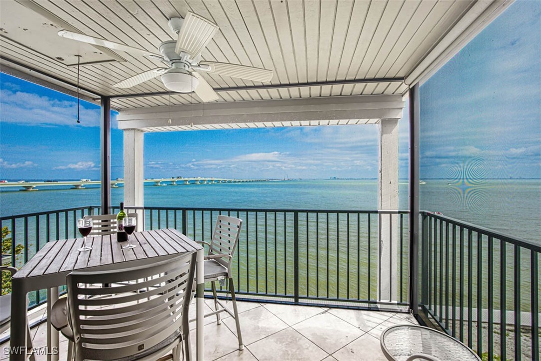 a view of a balcony with furniture