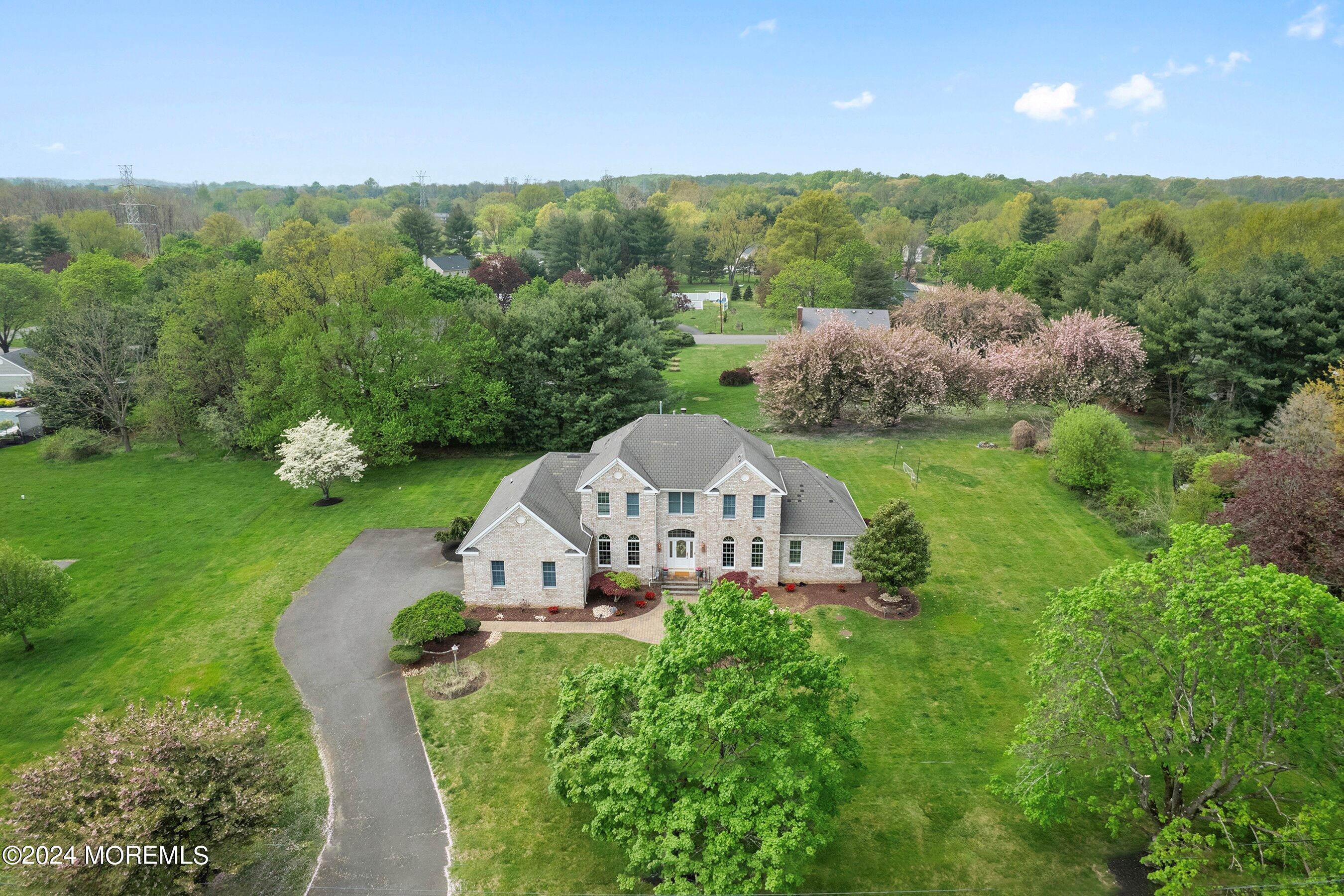 a view of a house with a big yard