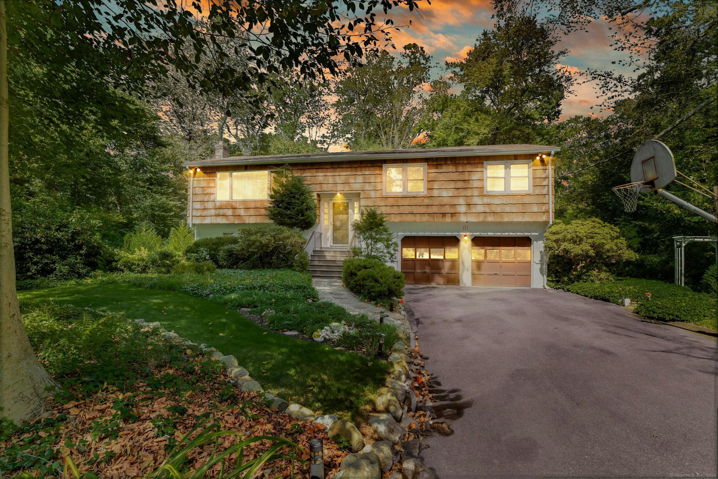 front view of a house with a yard