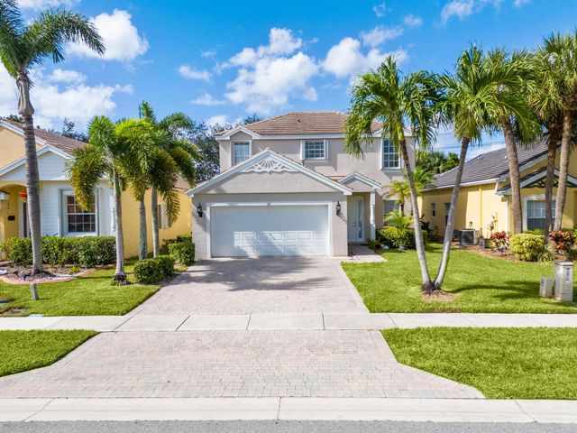 $569,999 | 241 Berenger Walk | Royal Palm Beach