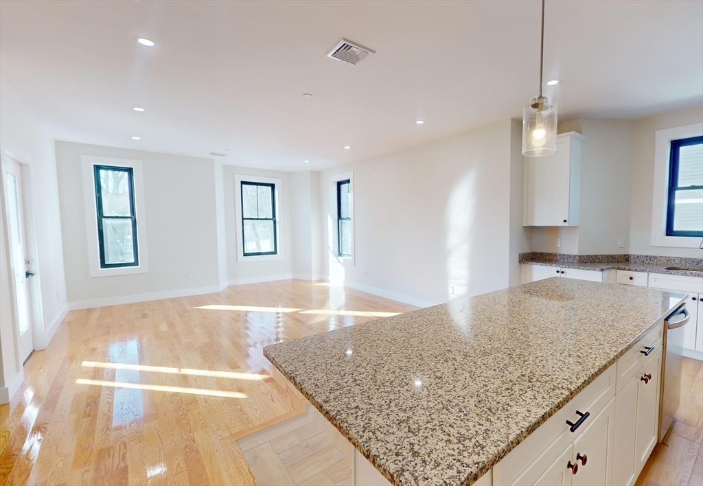 a view interior of a house with kitchen island