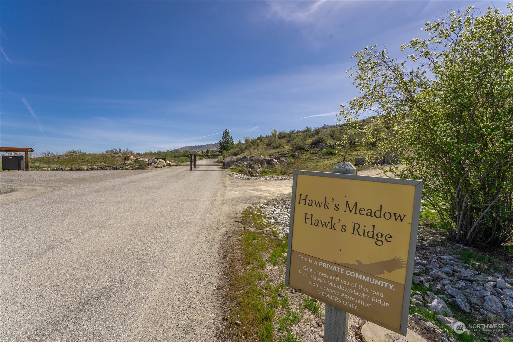 a sign board with a lake view