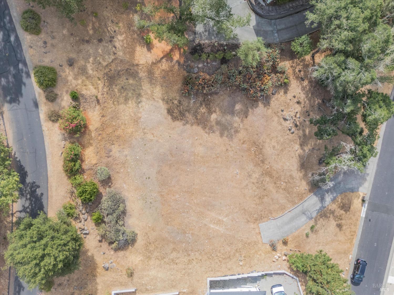 a aerial view of a house with a yard