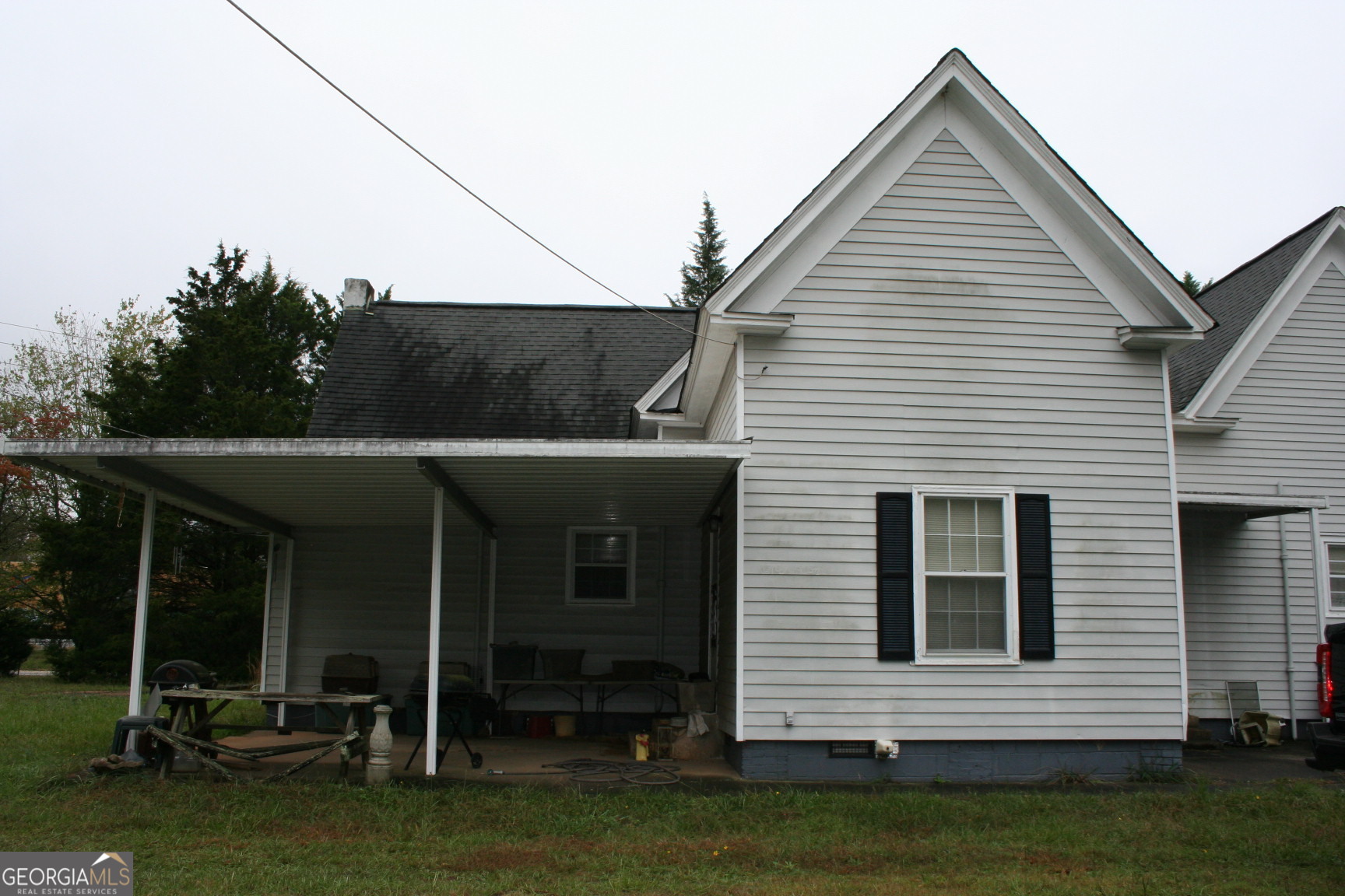 a view of a house with a roof deck