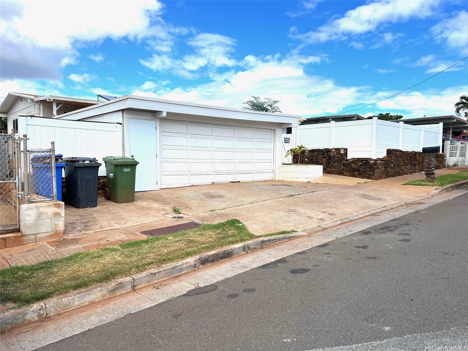 a view of a backyard of the house