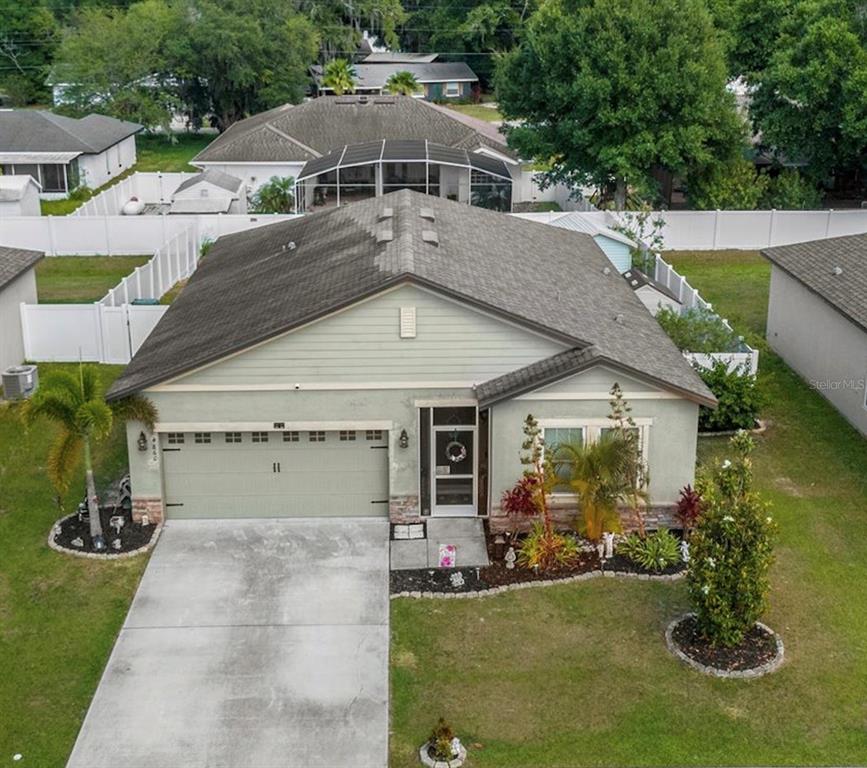 an aerial view of a house roof deck