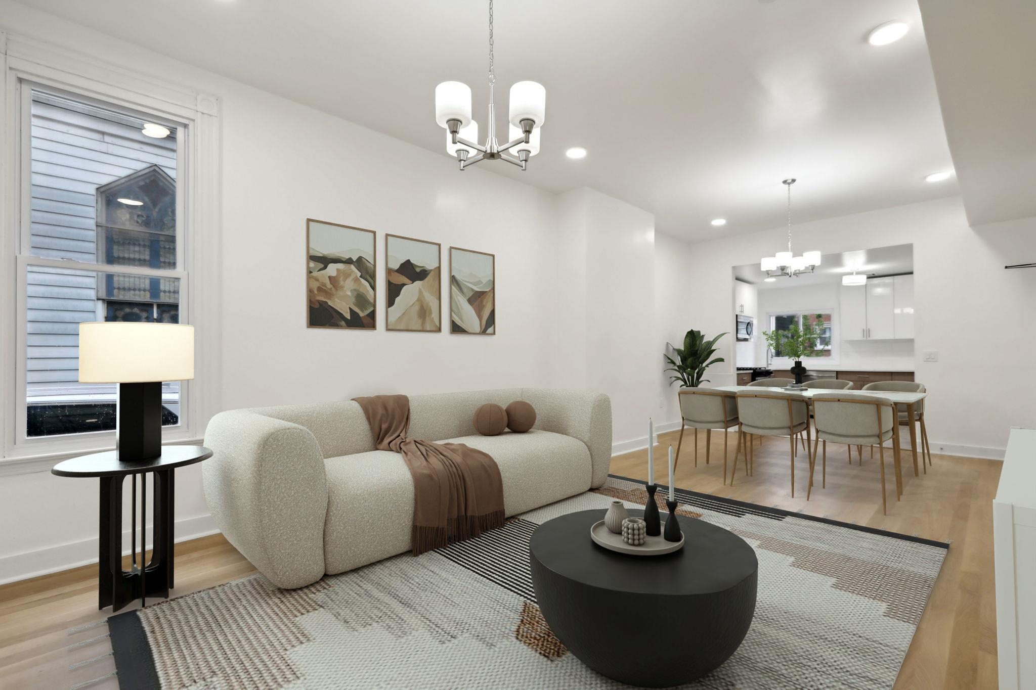 a living room with furniture and a table