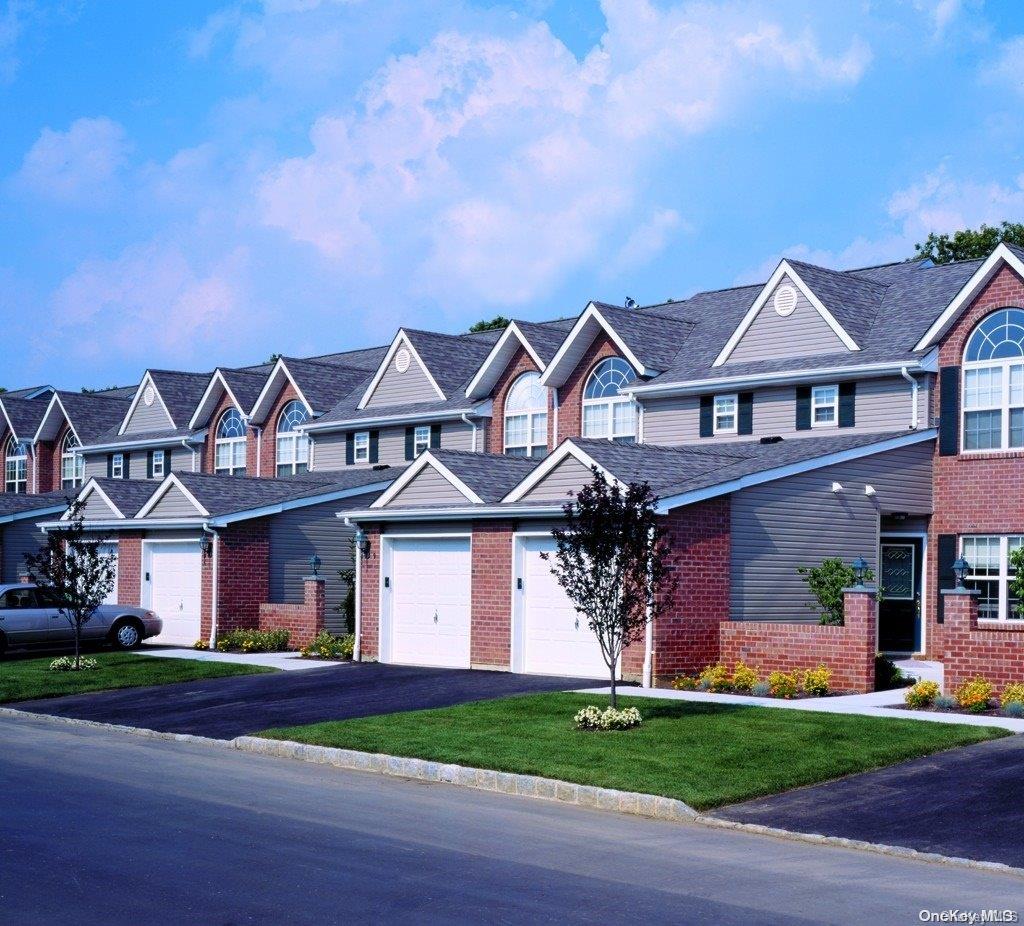 front view of house with a yard