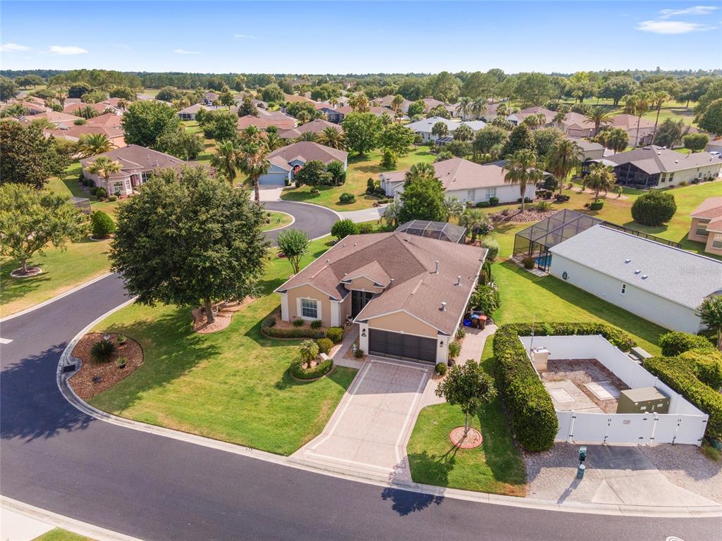 an aerial view of a house with a garden