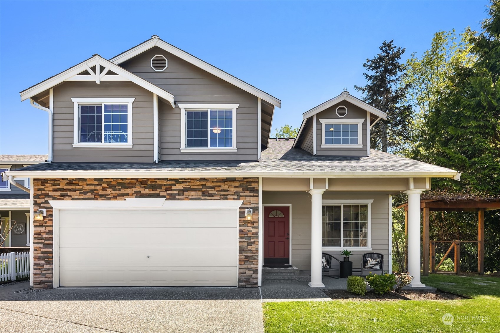 front view of a house with a yard