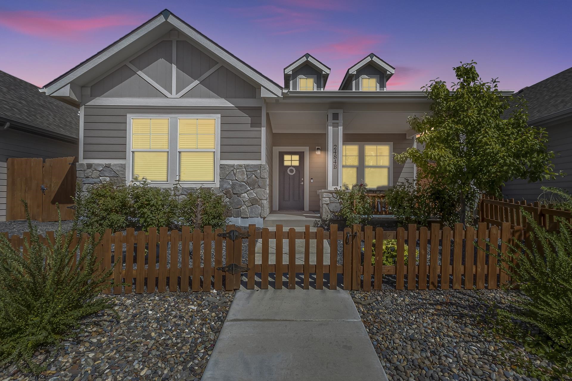 a front view of a house with a porch