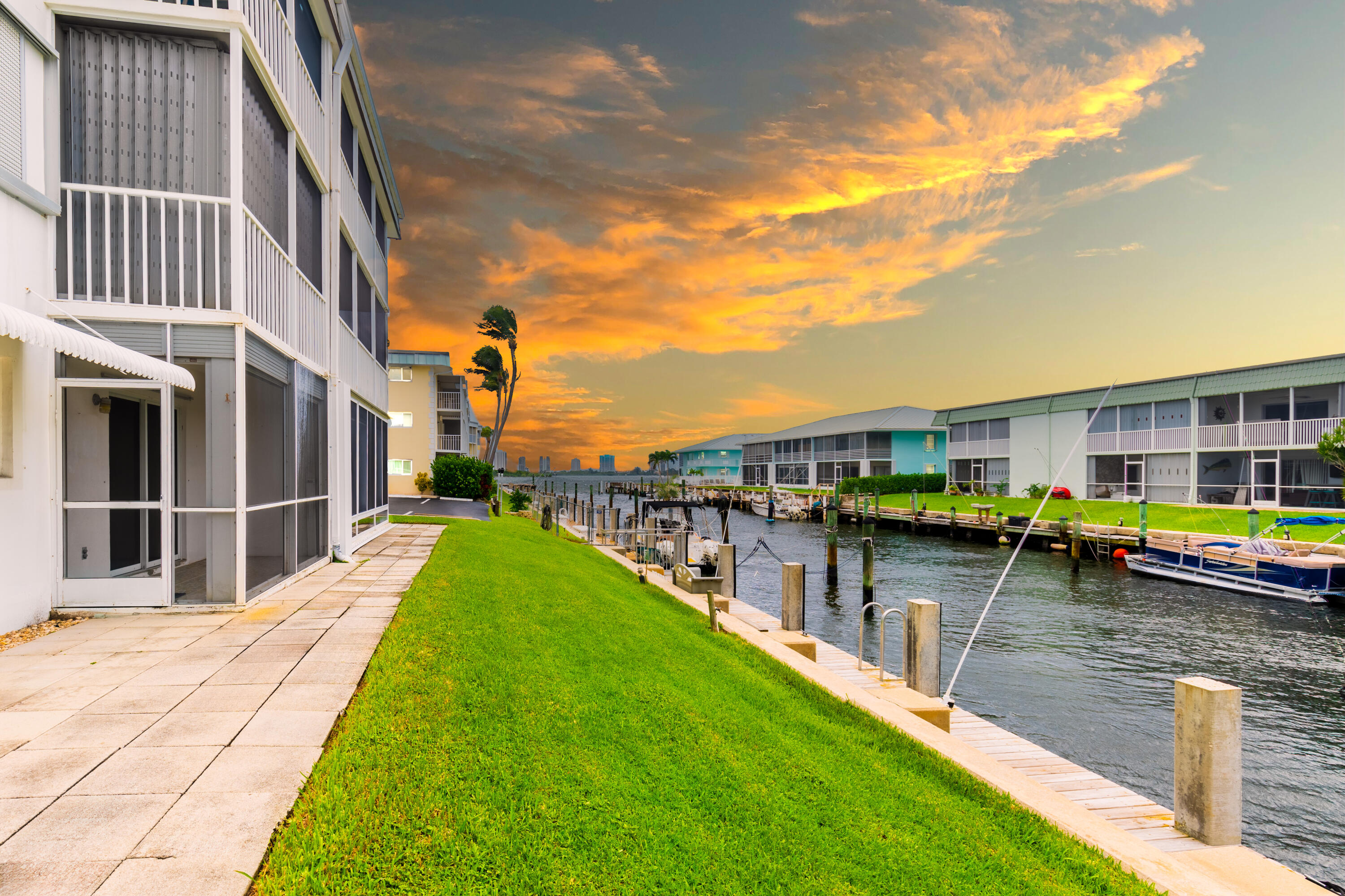 a view of a lake with a building in the background