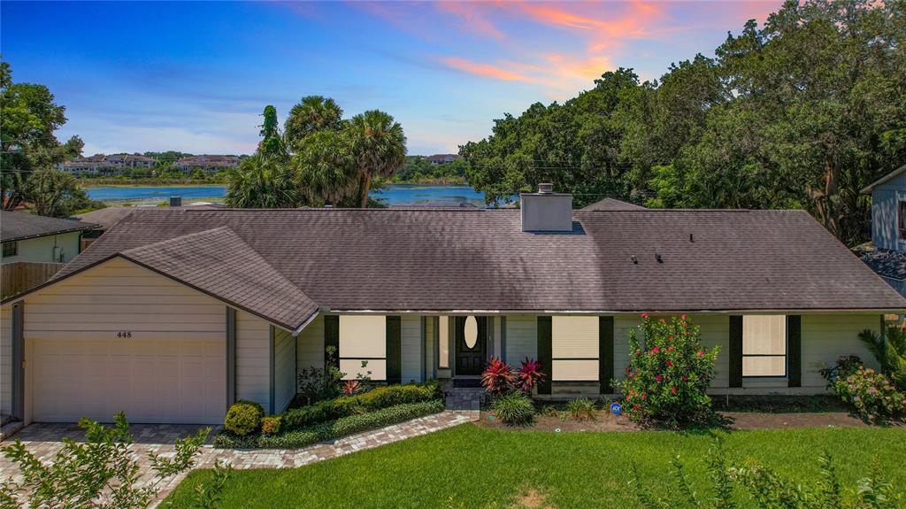 Exterior of 448 Stonewood Ln. with Lake Hope in the background