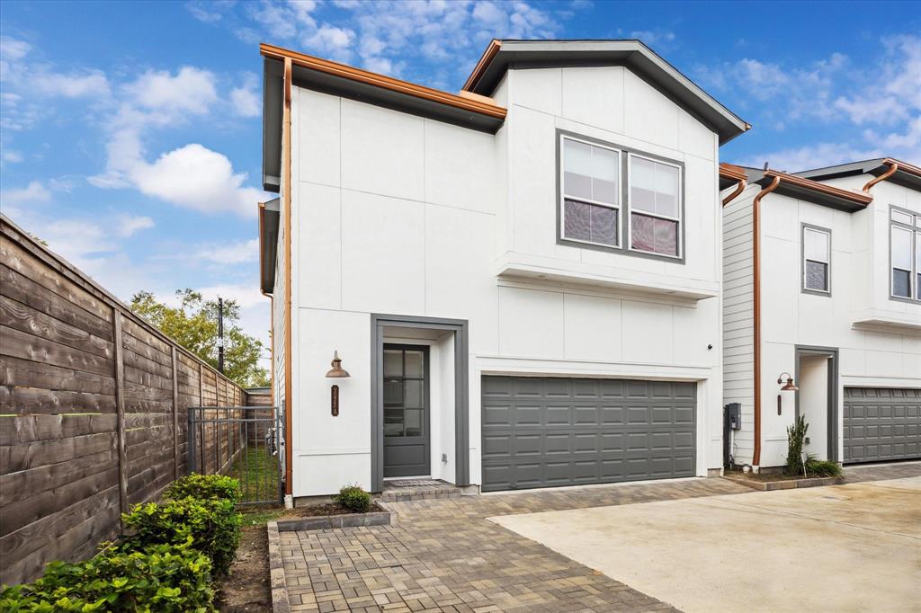 a view of a house with a garage