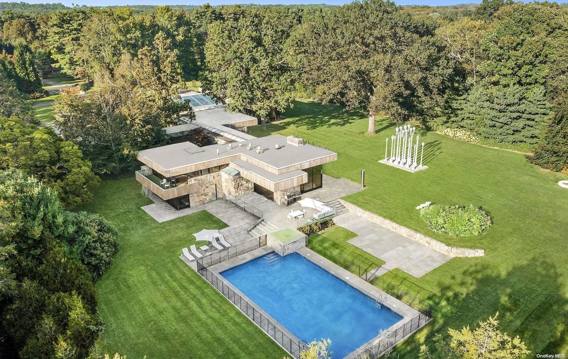 an aerial view of a house with a garden