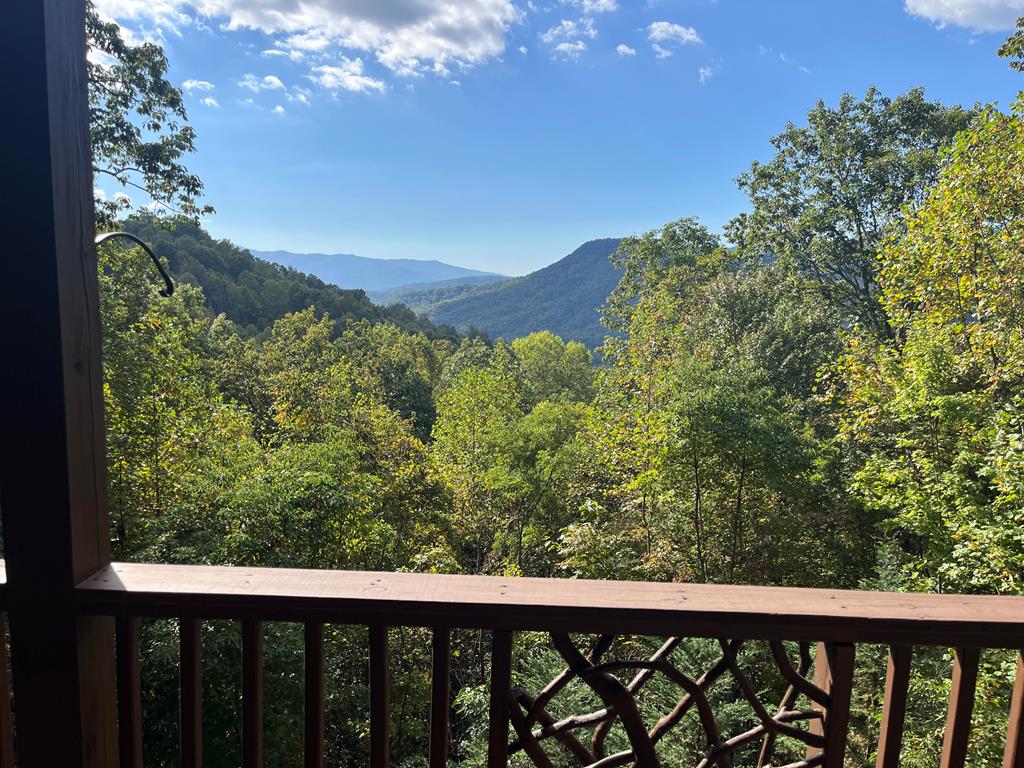 a view of a balcony with an outdoor space