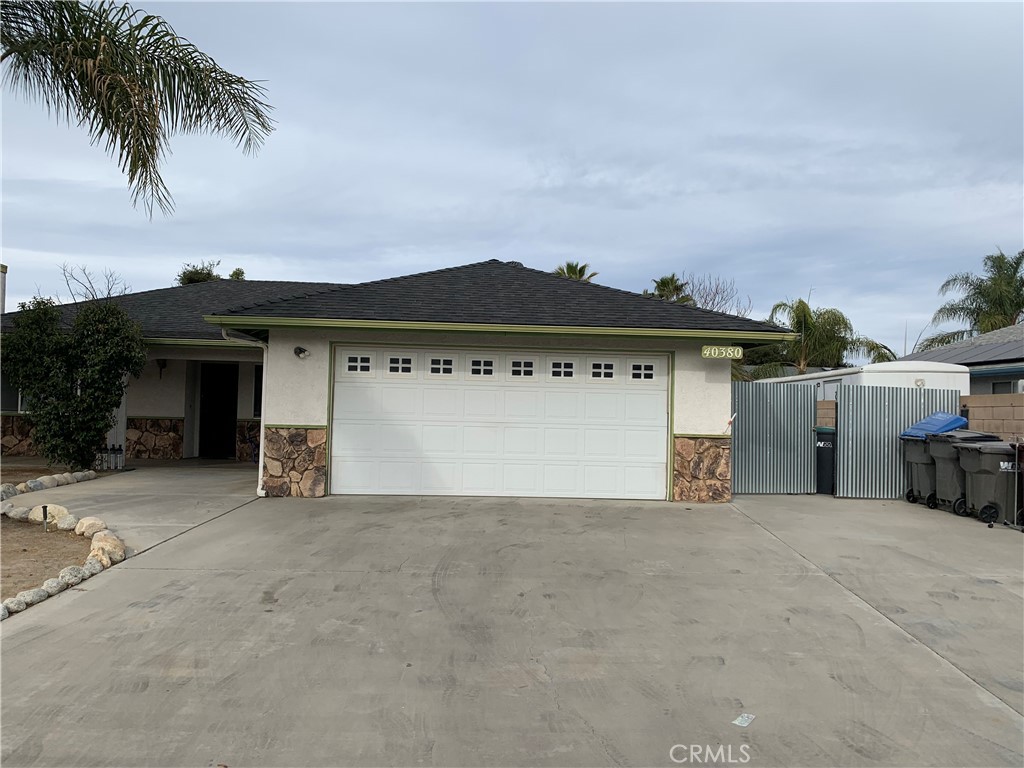 front view of a house with a garage