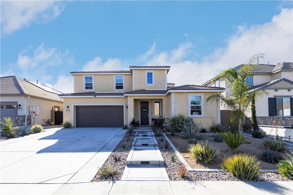 a front view of a house with yard