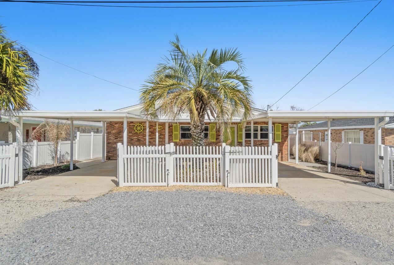 front view of a house with a big yard