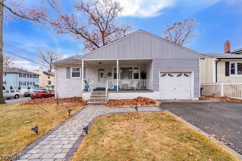 a front view of a house with patio