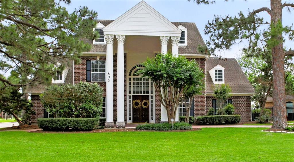 front view of house with a yard