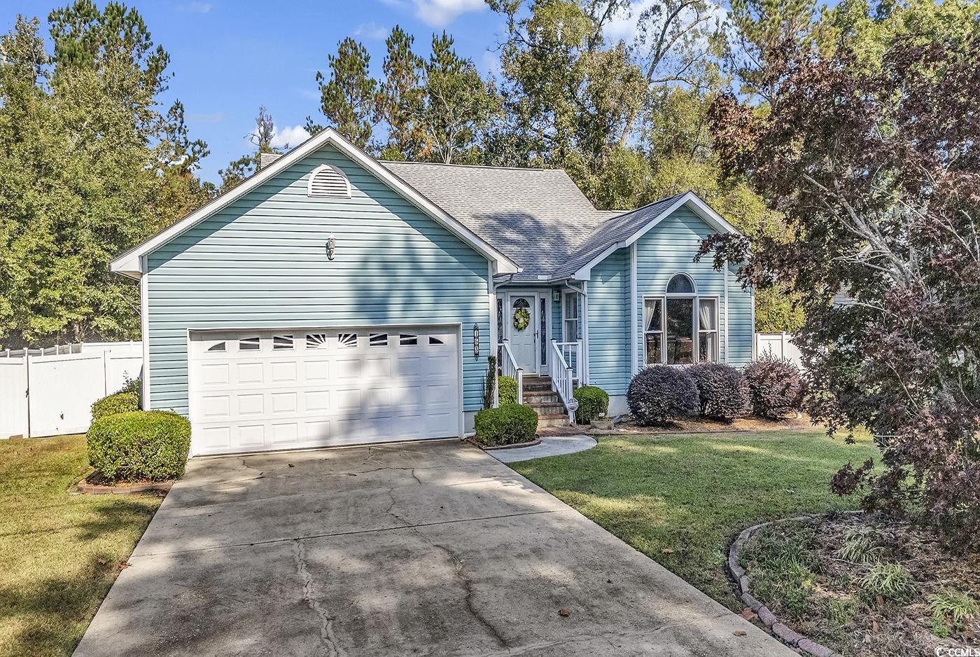 Ranch-style home with a front lawn and a nice two