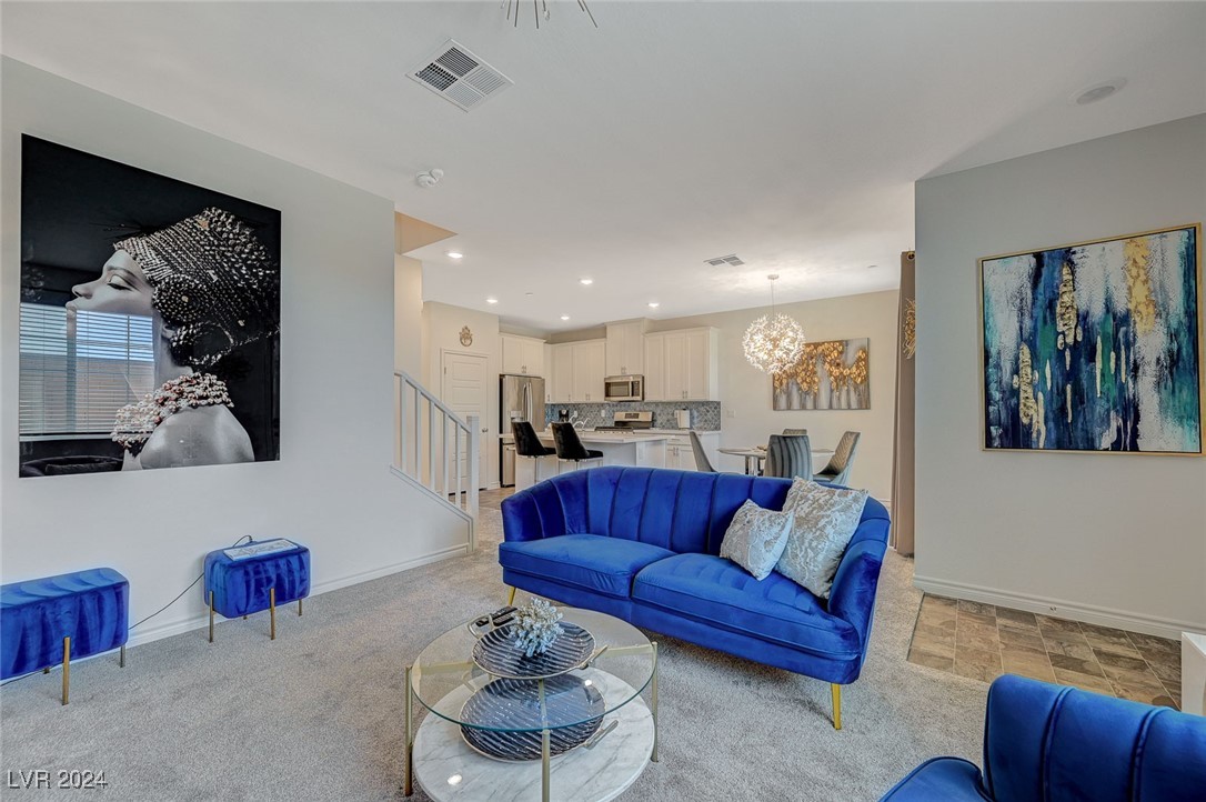 Open concept living room, dining room and kitchen