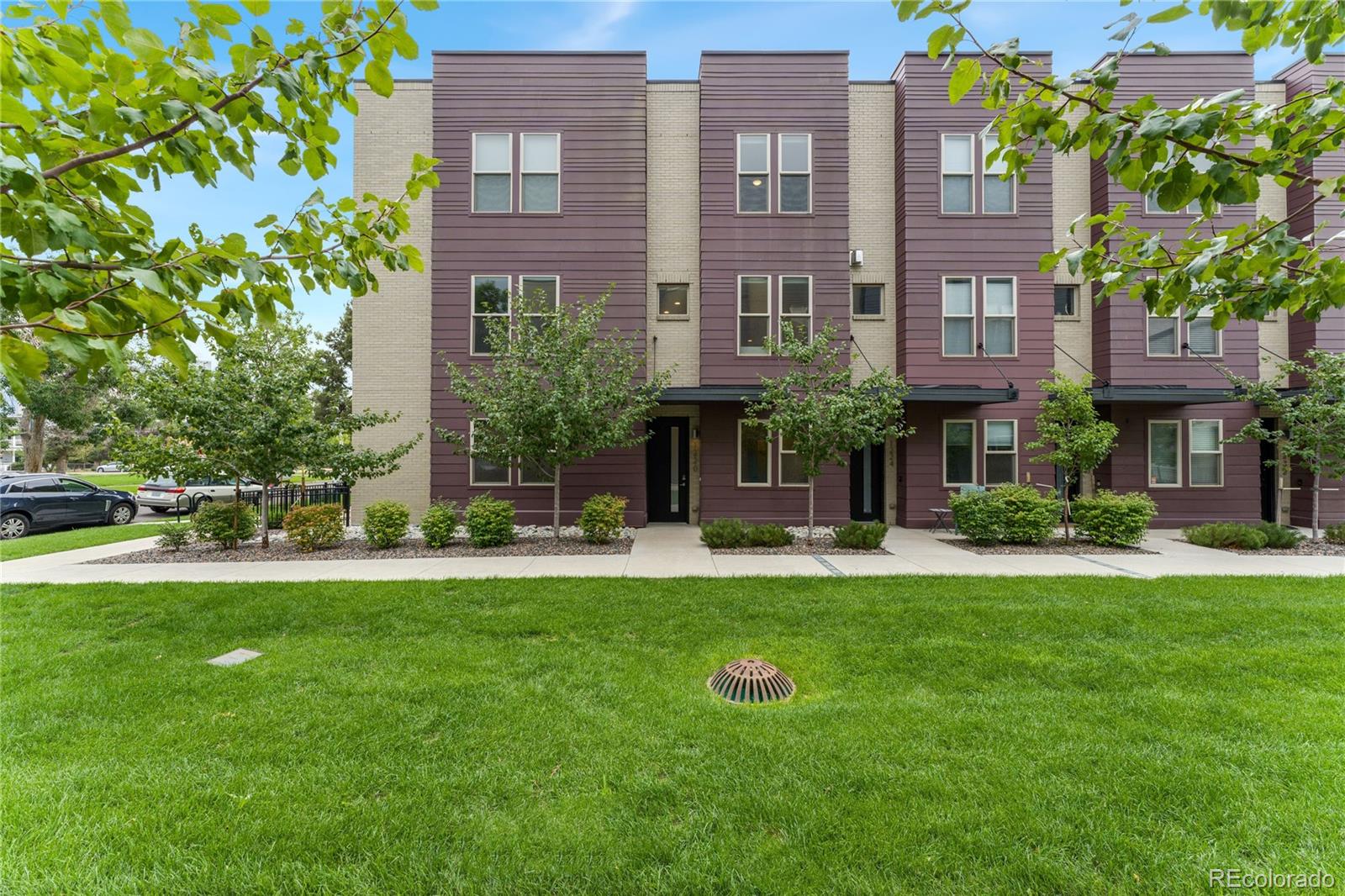 a view of a building with a yard