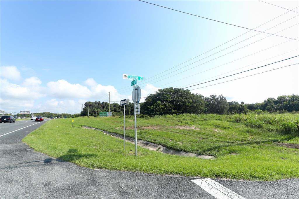 a view of a field with a big yard