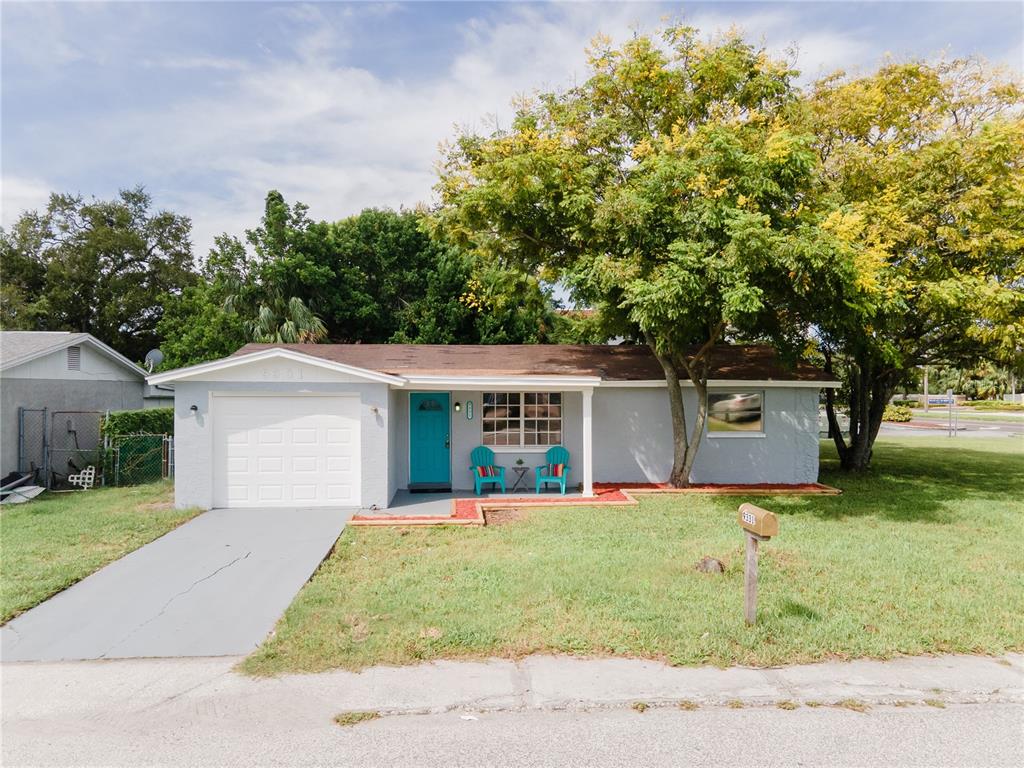 front view of a house with a yard