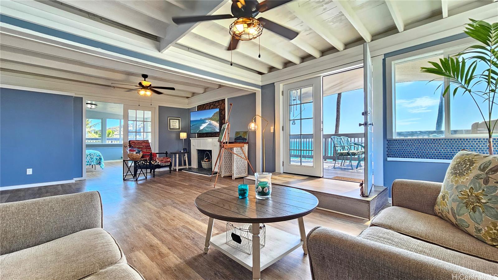 a living room with furniture and a table