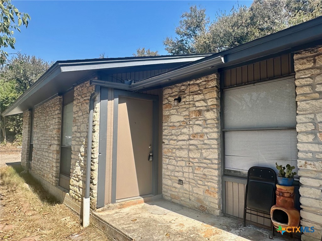 a front view of a house with patio