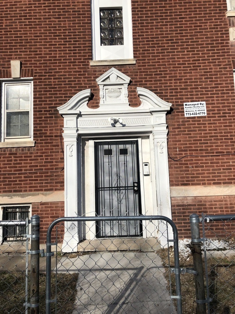 a front view of a house with parking