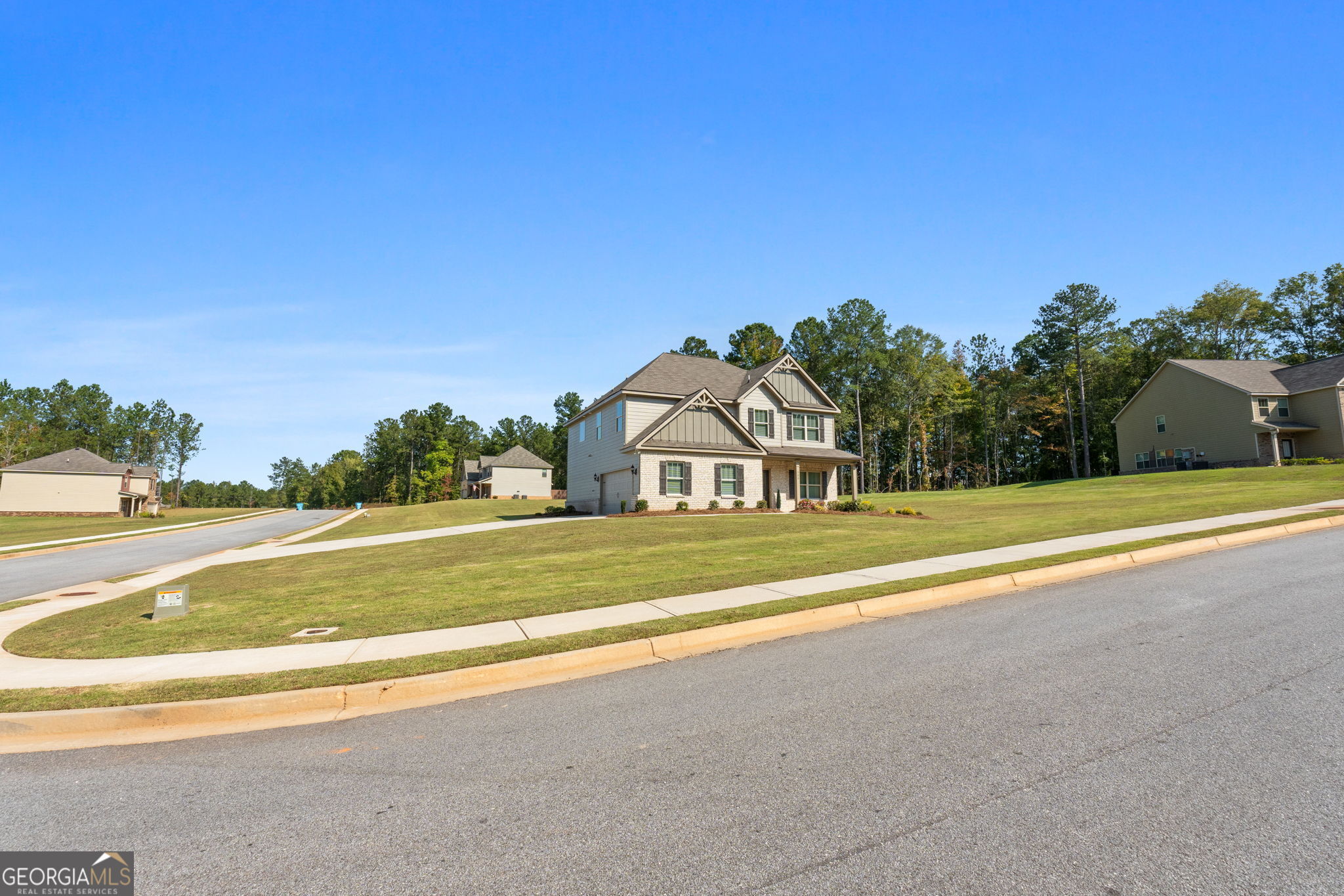 a view of a house with a big yard