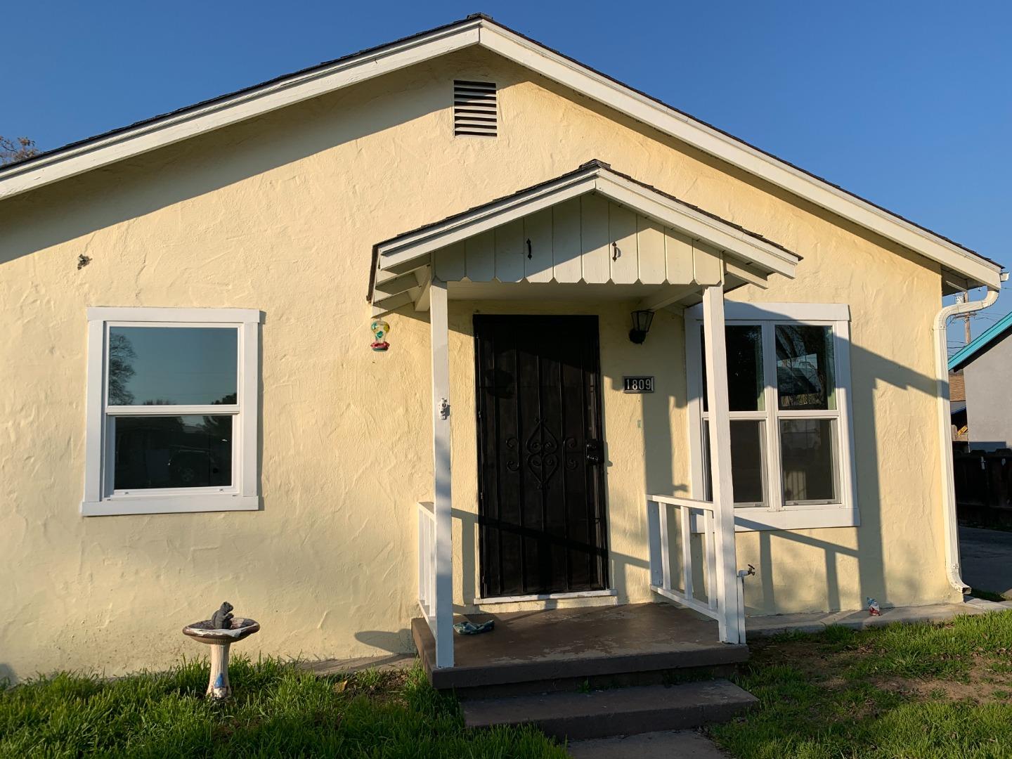 front view of a house with a small yard