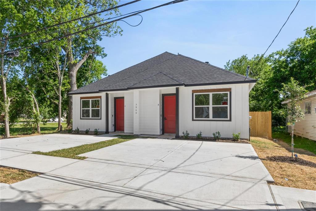 a house with yard in front of it