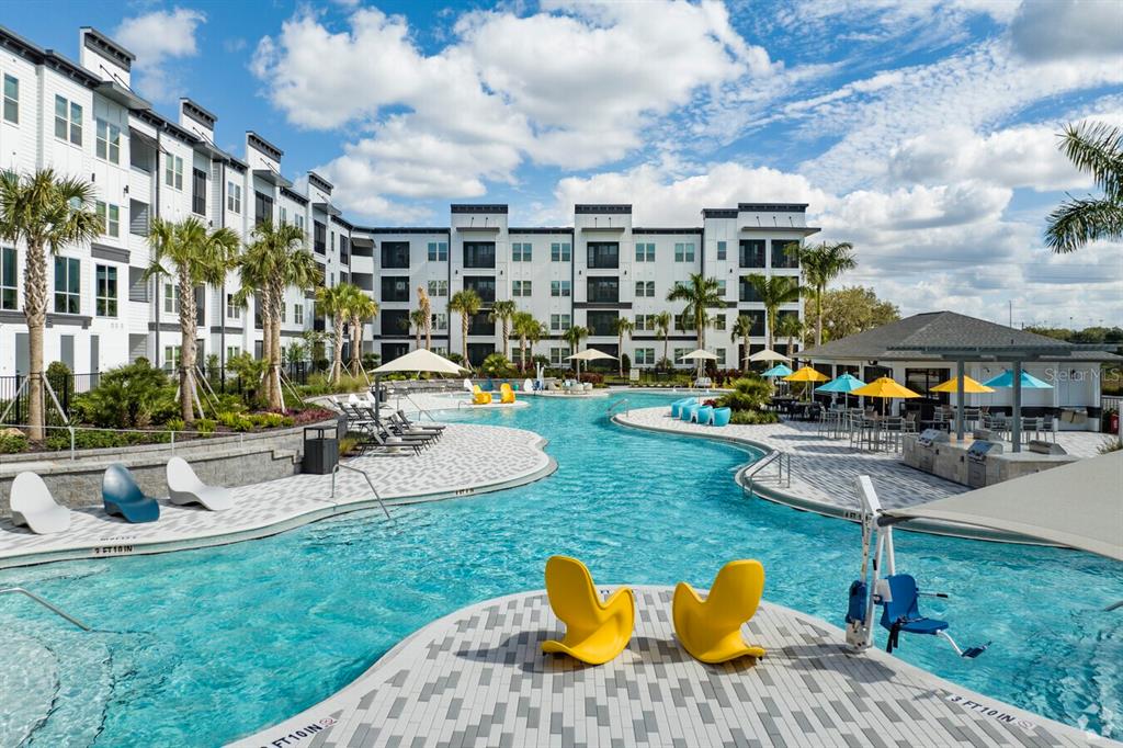 a view of a patio with couches and a table and chairs