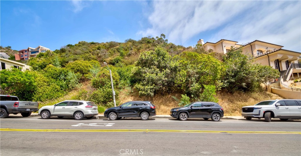 a view of a cars parked in front of a house