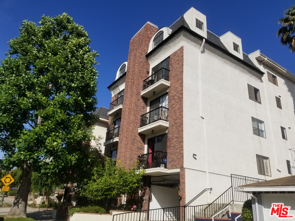 a front view of a building with balcony