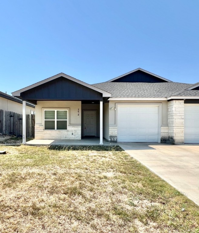 a house with yard in front of it