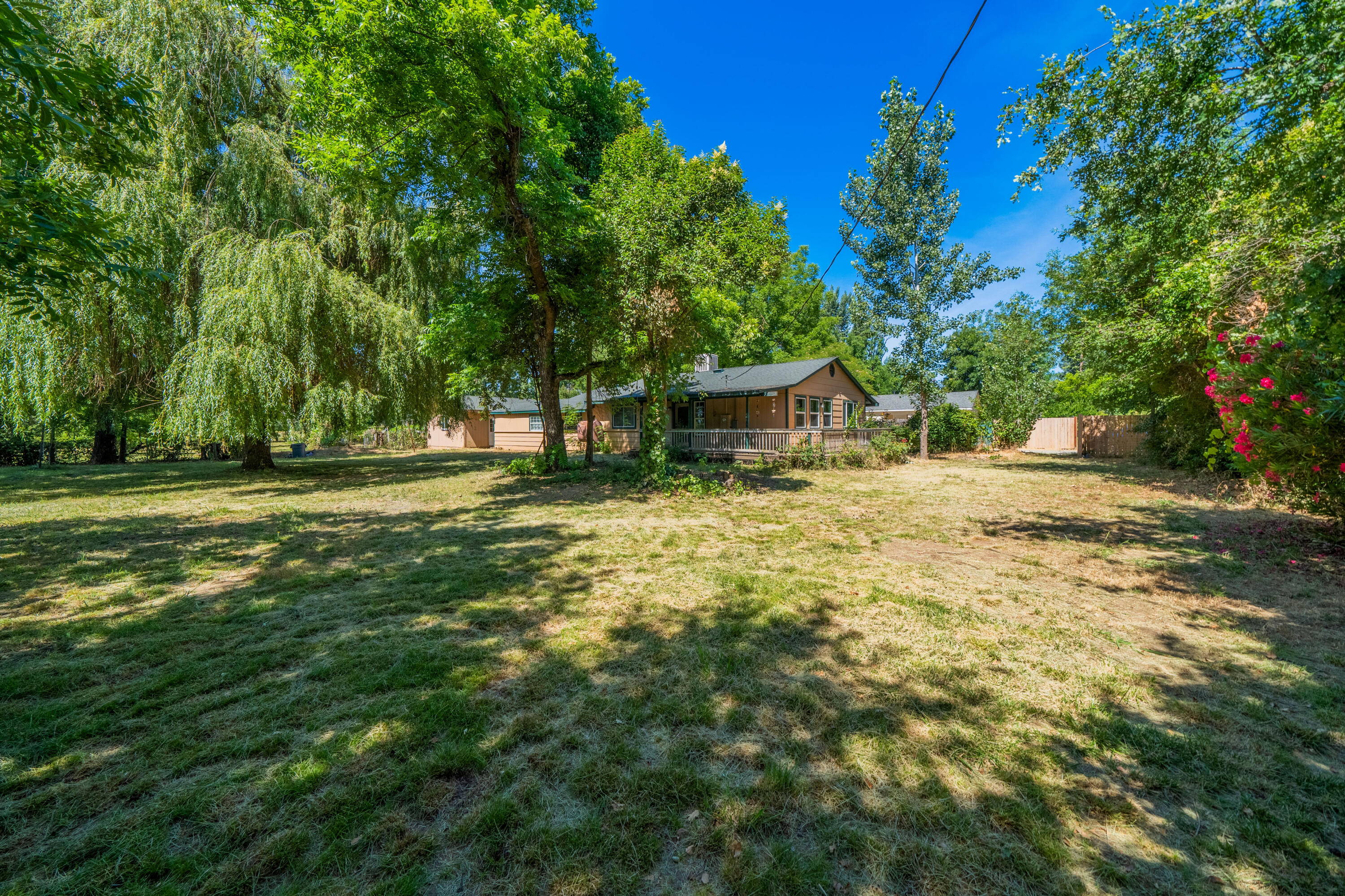 a view of a house with a big yard