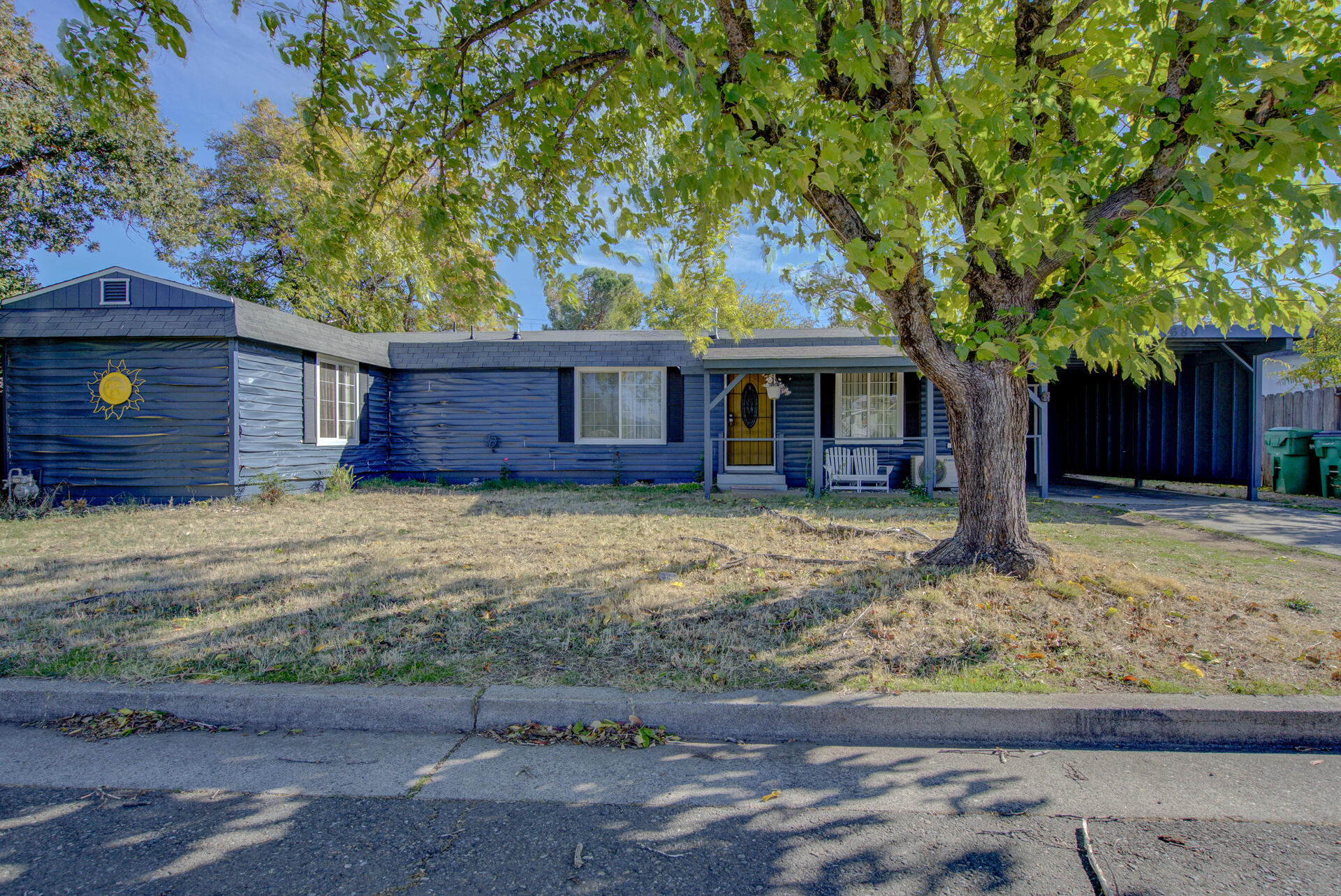 front view of a house with a yard