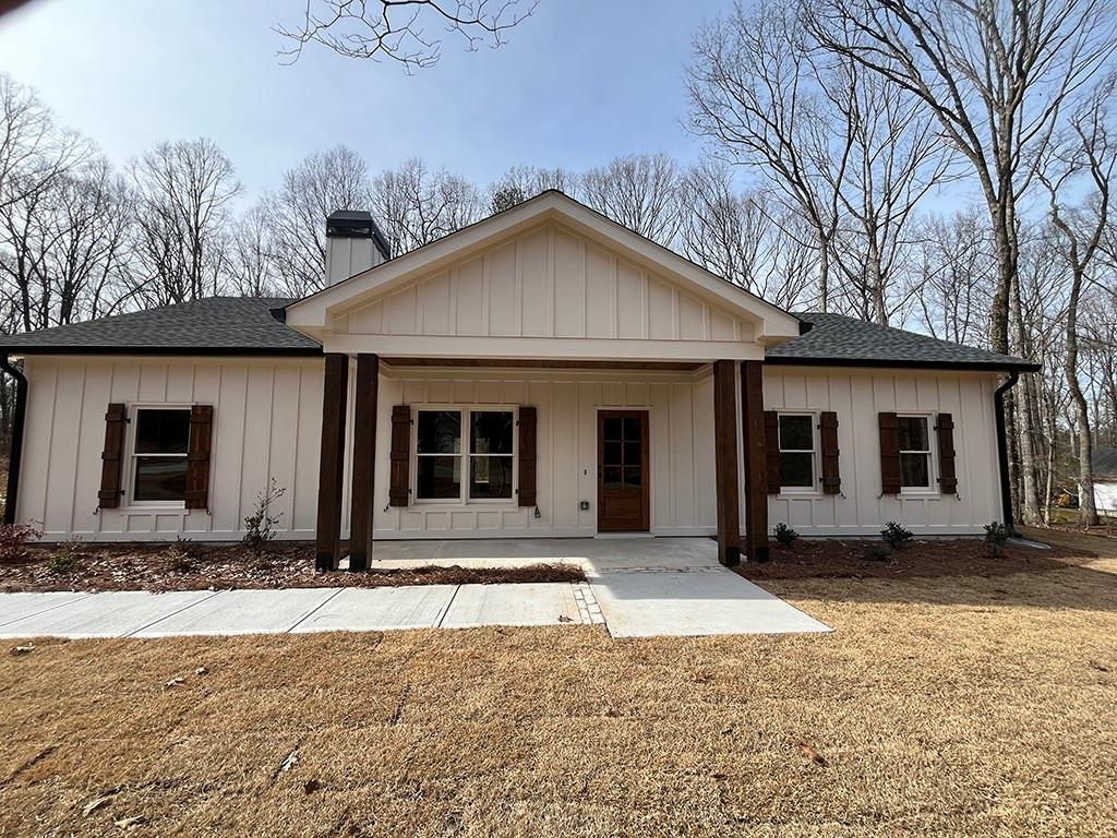 a front view of a house with yard