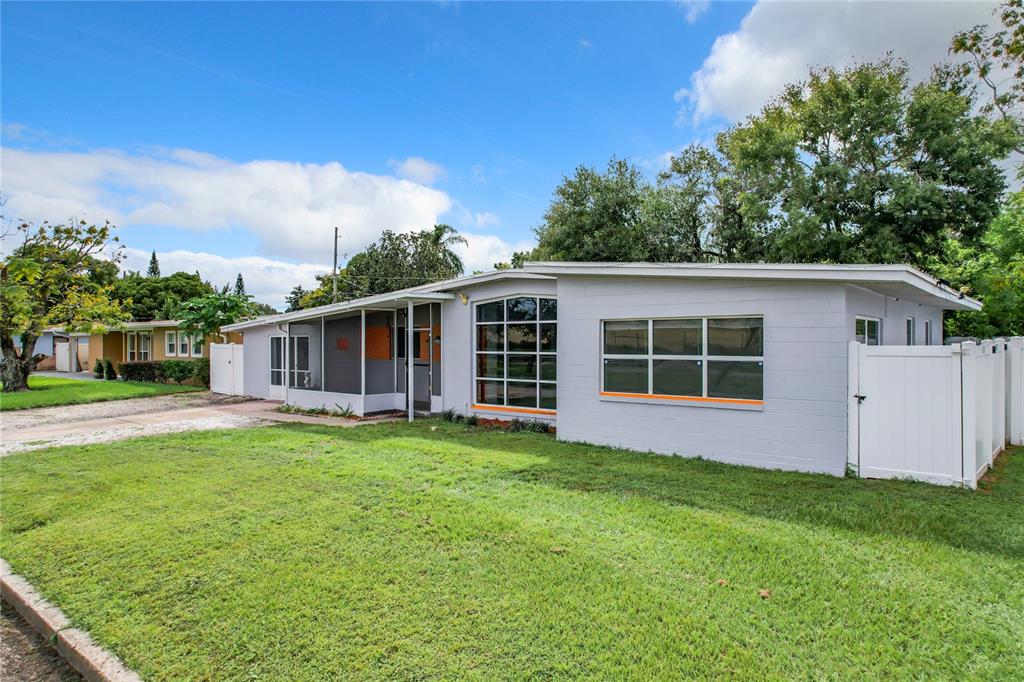 front view of a house with a yard