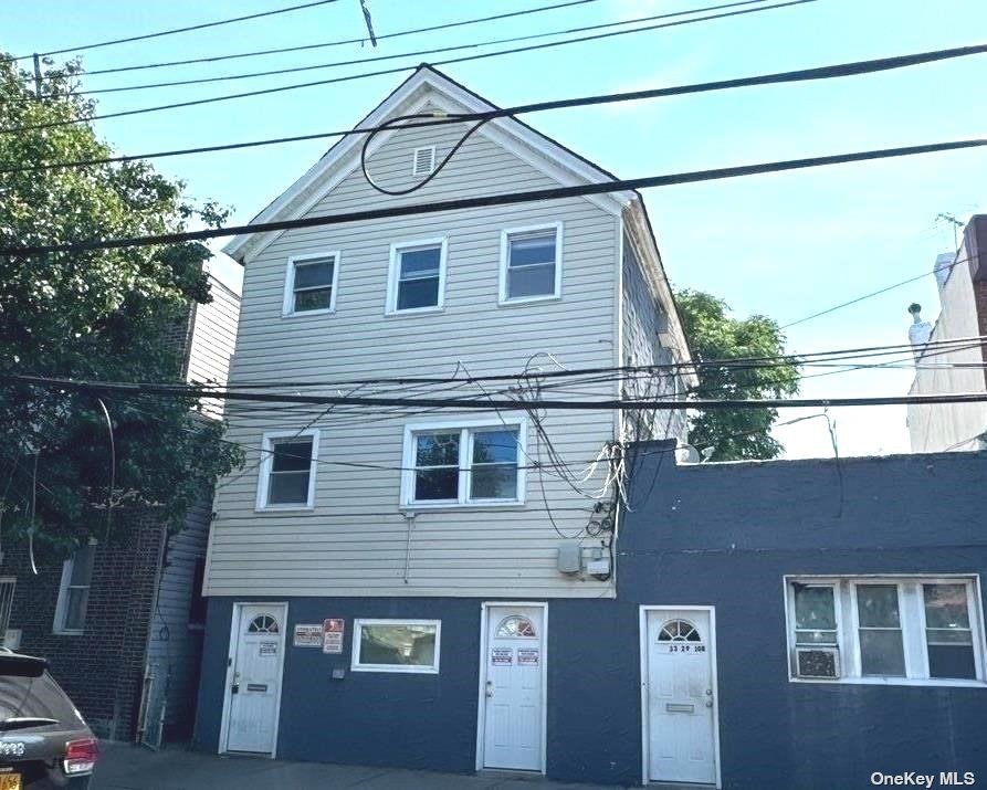 a view of a house with a street